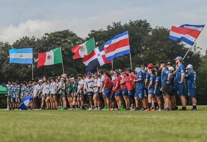 Players with national flags at a flying disc event